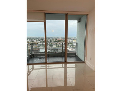 Experience luxury high-rise living in this beautifully updated