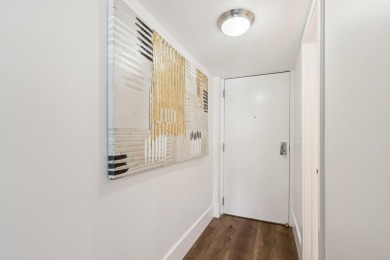 GORGEOUS TOTALLY REMODELED 1 BEDROOM 1 1/2 BATH 1ST FLOOR UNIT