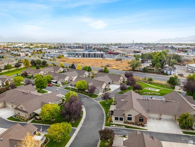 Welcome to easy, main-level living in the warm and welcoming