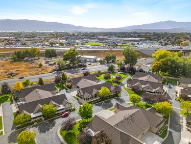 Welcome to easy, main-level living in the warm and welcoming