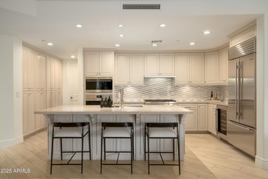 Experience elevated waterfront living in the heart of