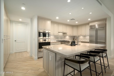 Experience elevated waterfront living in the heart of