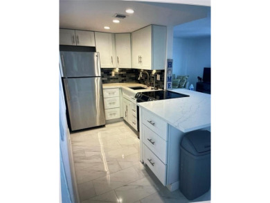 Totally remodeled, with new windows, doors, floors Plus new