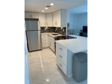 Totally remodeled, with new windows, doors, floors Plus new