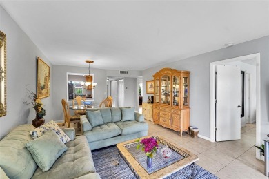 Welcome to this bright and spacious third-floor condo in a