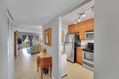 Welcome to this bright and spacious third-floor condo in a
