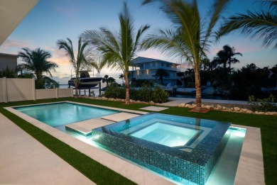 BRAND NEW CONSTRUCTION WITH BAY VIEWS! Welcome to a stunning new