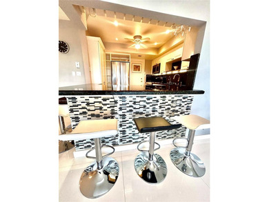 Live the Dream with Stunning Intracoastal & Golf Course Views!