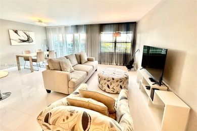 Live the Dream with Stunning Intracoastal & Golf Course Views!