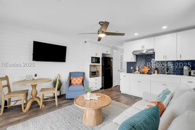 Step into coastal luxury at Admirals Row A1, a first-floor end