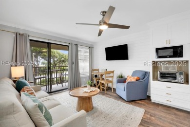 Step into coastal luxury at Admirals Row A1, a first-floor end