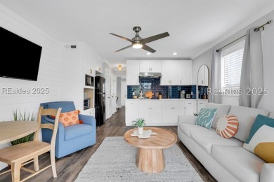 Step into coastal luxury at Admirals Row A1, a first-floor end