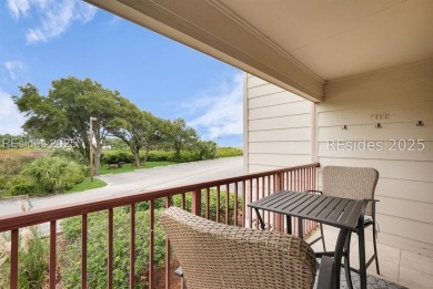 Step into coastal luxury at Admirals Row A1, a first-floor end