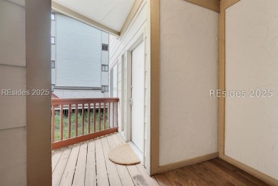 Step into coastal luxury at Admirals Row A1, a first-floor end