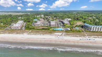 Step into coastal luxury at Admirals Row A1, a first-floor end