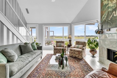 Designer upgraded condo with front porch, two private decks and