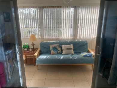 Welcome to this partially furnished 2nd floor condo located in a