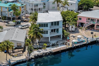 Escape to luxury in this newly constructed all concrete home