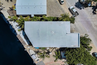 Escape to luxury in this newly constructed all concrete home