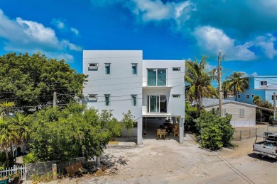 Escape to luxury in this newly constructed all concrete home