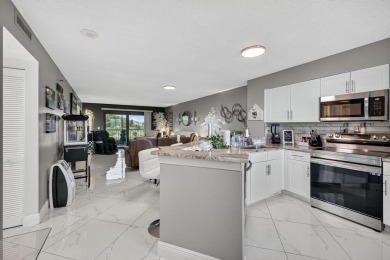 Must see! Highly desirable Cypress Bend community! Completely