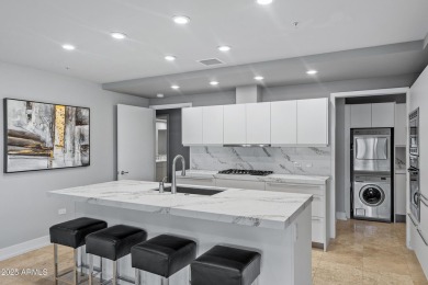 Rare unit with two expansive patios showcasing spectacular