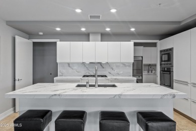 Rare unit with two expansive patios showcasing spectacular