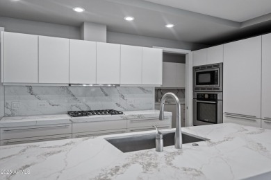 Rare unit with two expansive patios showcasing spectacular