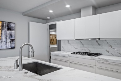 Rare unit with two expansive patios showcasing spectacular