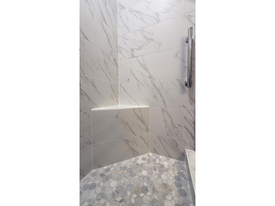 This beautifully updated Driftwood Estates home offers