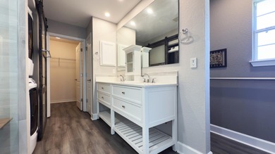 This beautifully updated Driftwood Estates home offers