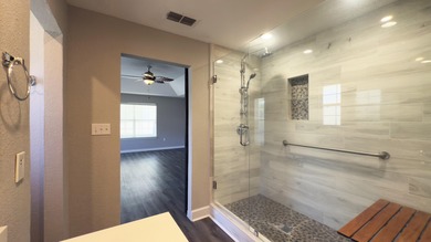 This beautifully updated Driftwood Estates home offers