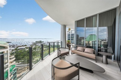 Positioned on a premier penthouse level, this residence