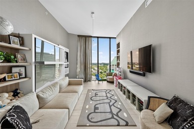 Positioned on a premier penthouse level, this residence
