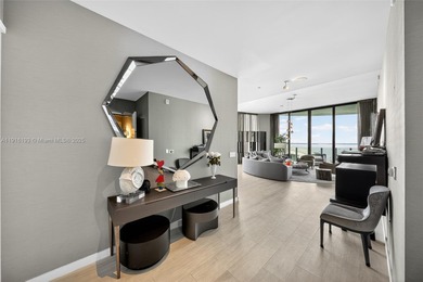 Positioned on a premier penthouse level, this residence