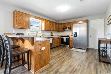 Welcome to this charming 3-bedroom, 2-bath ranch brick home