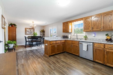 Welcome to this charming 3-bedroom, 2-bath ranch brick home