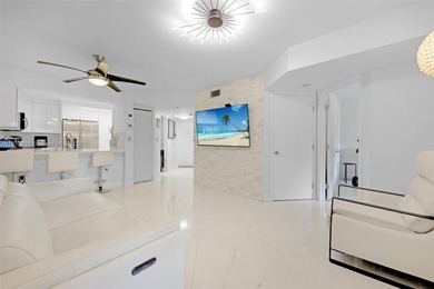 Welcome to the heart of Miami Lakes! This beautifully renovated