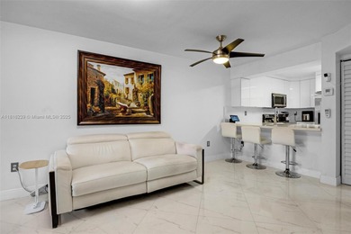 Welcome to the heart of Miami Lakes! This beautifully renovated