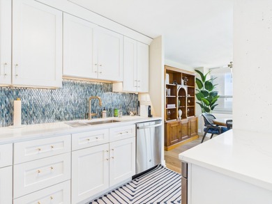 BREATHTAKING LAKEFRONT PARADISE IN THE SKY - A 3 BEDROOM, 3 BATH