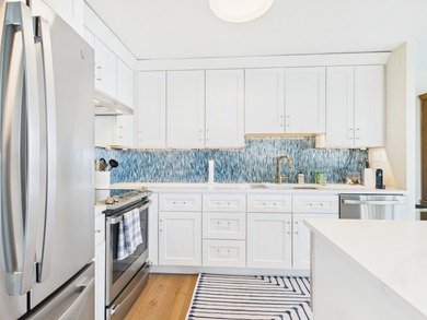 BREATHTAKING LAKEFRONT PARADISE IN THE SKY - A 3 BEDROOM, 3 BATH