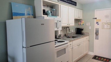 Elevate your beachside getaway with this beautiful efficiency