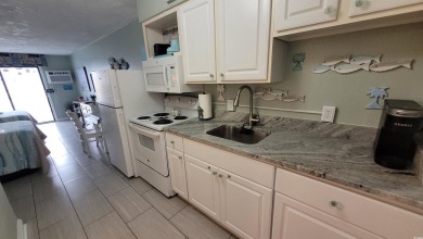 Elevate your beachside getaway with this beautiful efficiency