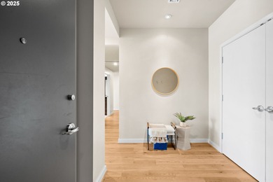 Step into elevated urban living in this 10th-floor condo at The