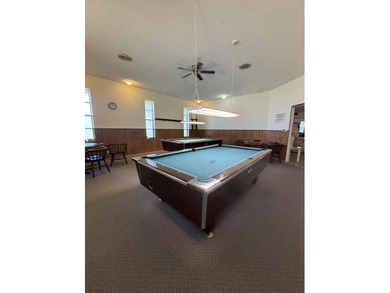 Located in the well-maintained 55+ Regal Palms Community with