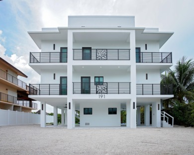 Welcome to your dream coastal retreat! This brand-new modern