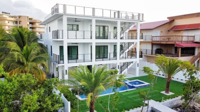 Welcome to your dream coastal retreat! This brand-new modern