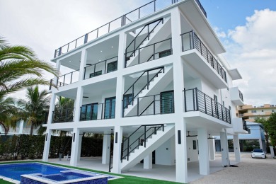 Welcome to your dream coastal retreat! This brand-new modern