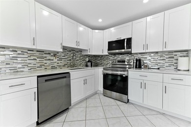 Beautifully updated 1 bedroom,1.5 bathroom condo located in the