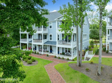 Serene river views await in this gorgeous end-unit